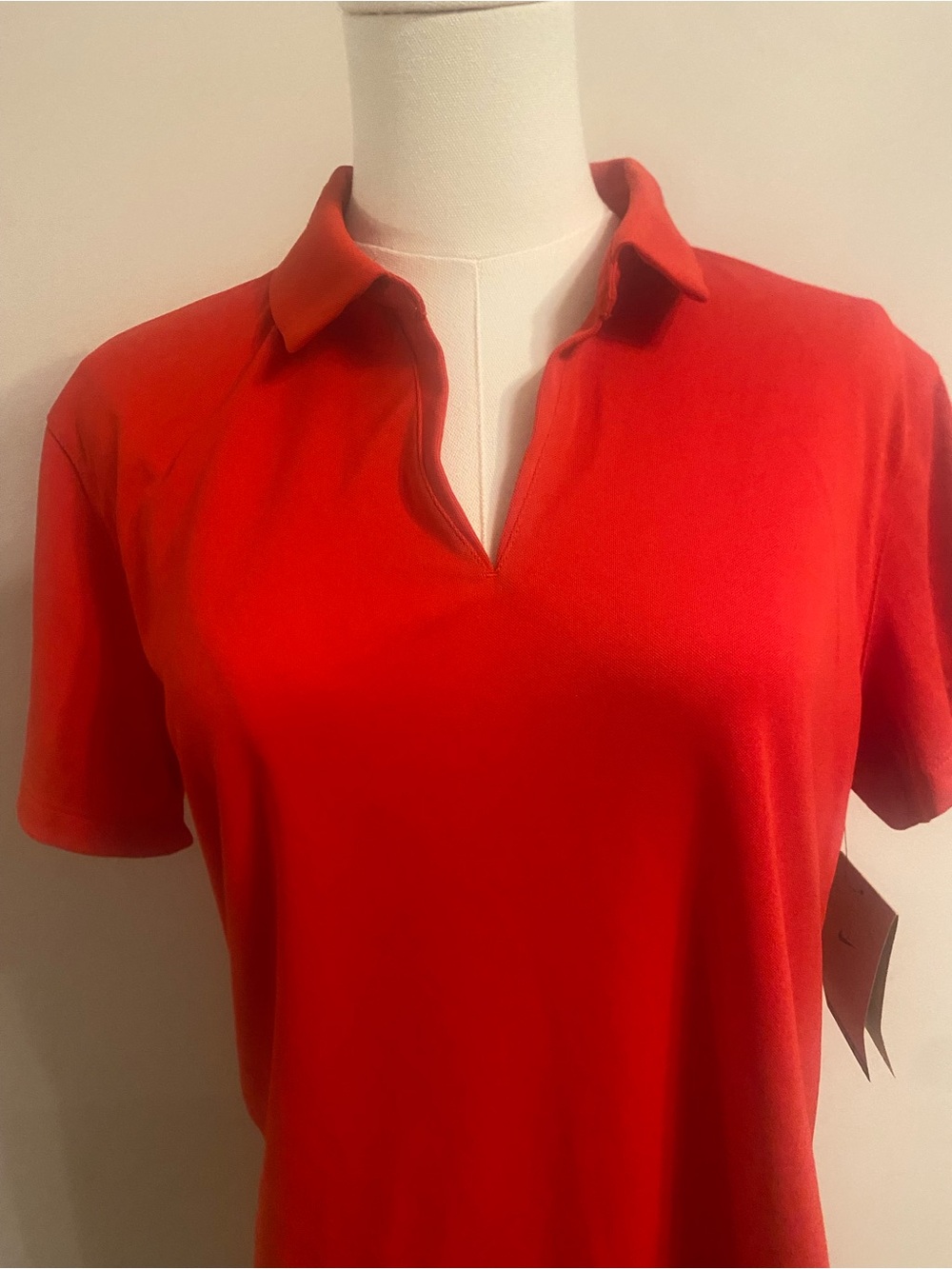Red Nike Polo-Style Women's Top move
To zero